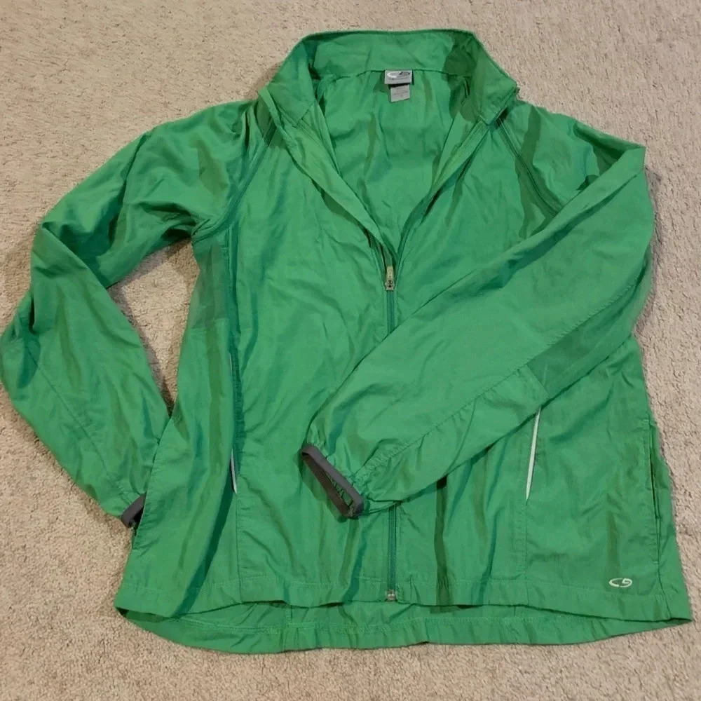 Champion XL green windbreaker with zip-off sleeves